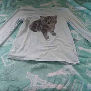 A long sleeve shirt with a kitty on it